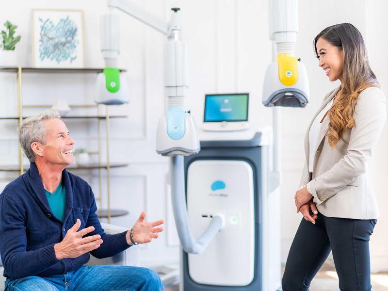 TMS-for-Cognitive-Decline Clinician administering a non-invasive brain stimulation session to an older patient, demonstrating how TMS for dementia may support cognitive function